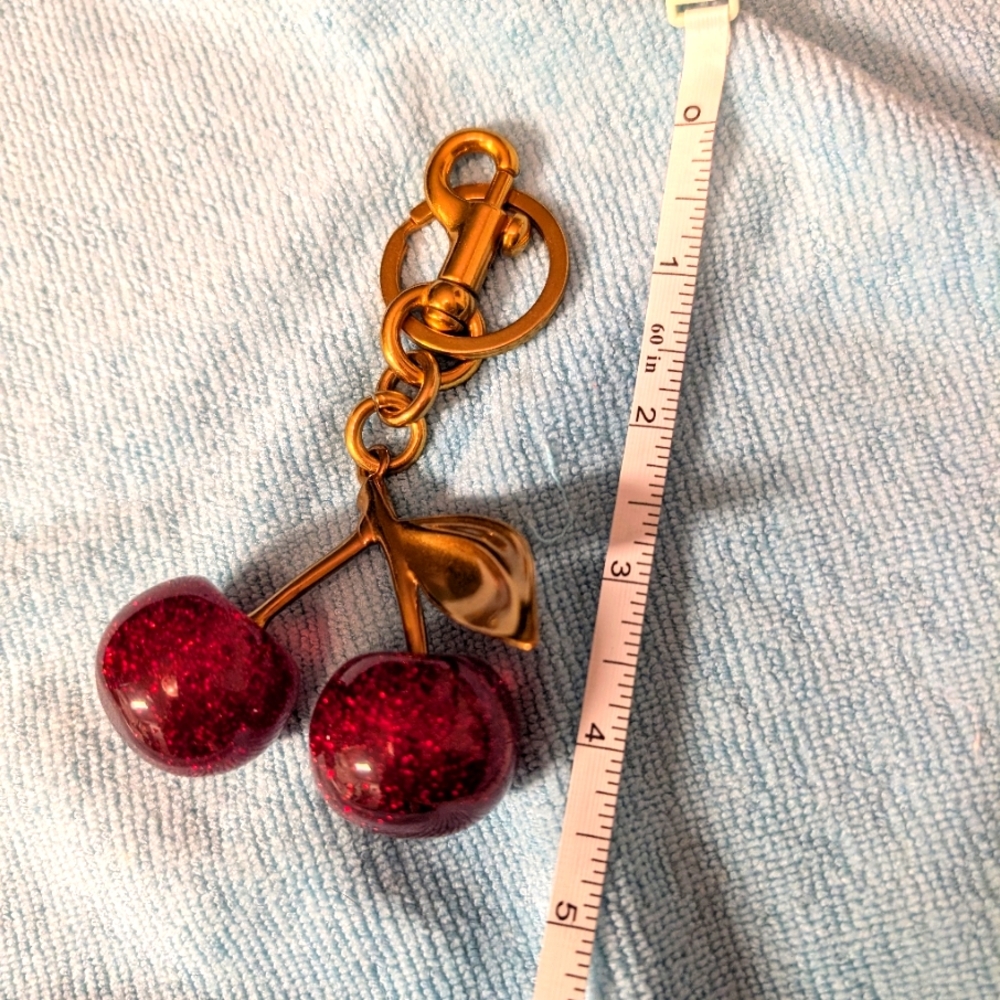 Charming Cherry Keychain with Gold Accents